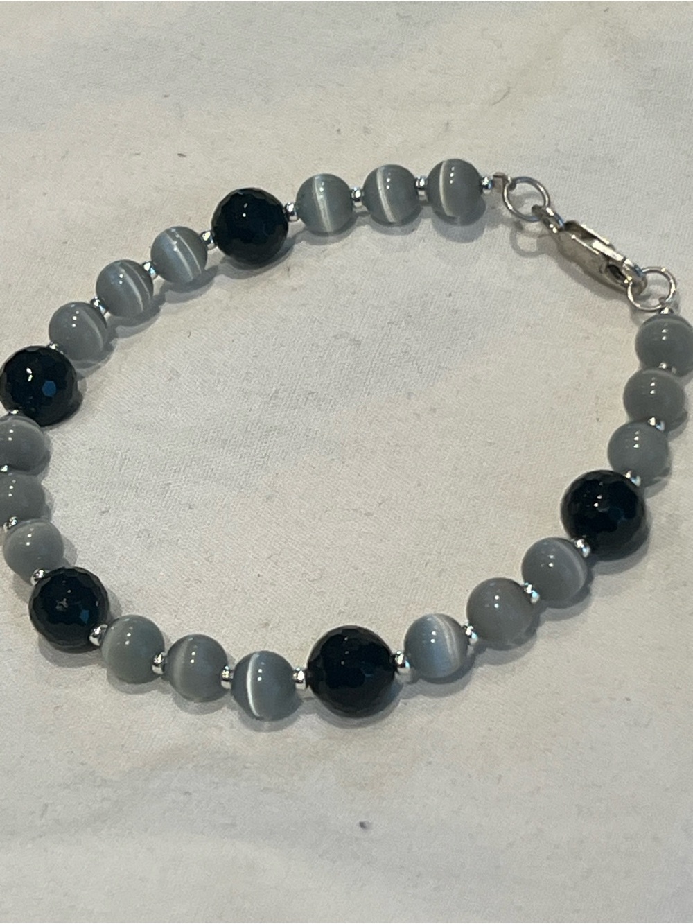 Cats eye and black onyx sterling silver bracelet